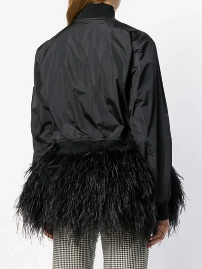 Shop Moschino Feather Trim Bomber Jacket In Black