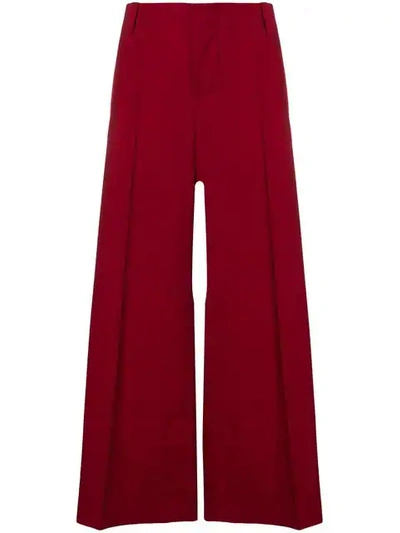 Shop Marni Flared Trousers In Red