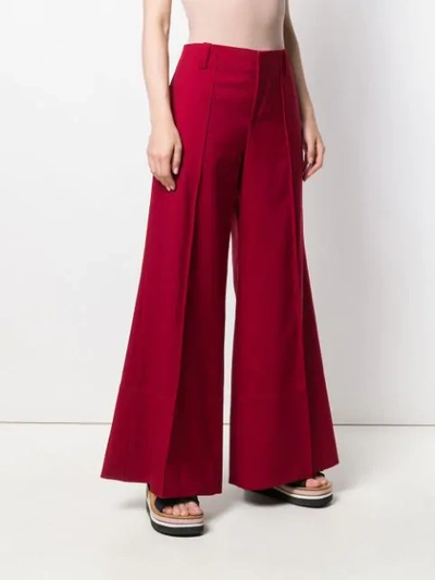 Shop Marni Flared Trousers In Red