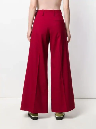 Shop Marni Flared Trousers In Red