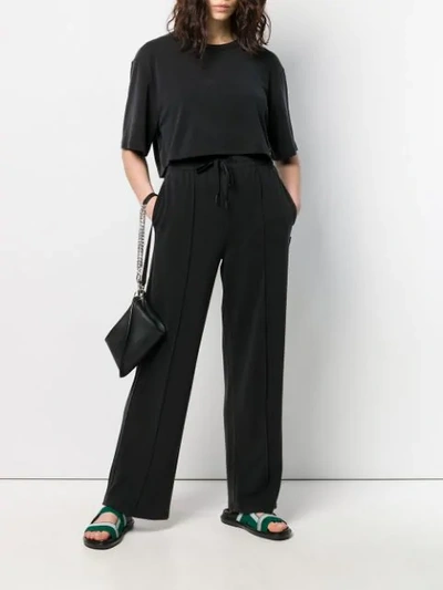 Shop Alexander Wang Exposed Seam Jogging Trousers In Black