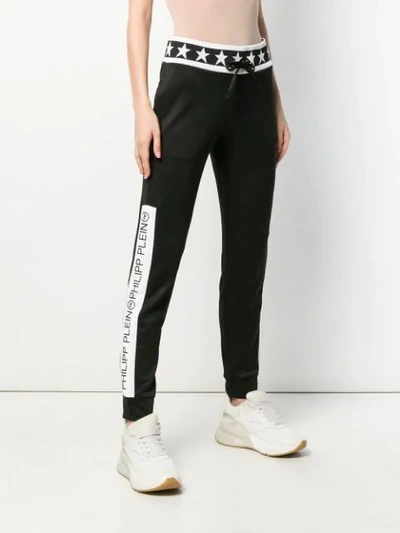 Shop Philipp Plein Graphic Track Pants - Black