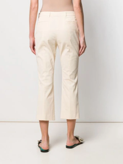 Shop The Gigi Cropped Slim Fit Trousers In Neutrals