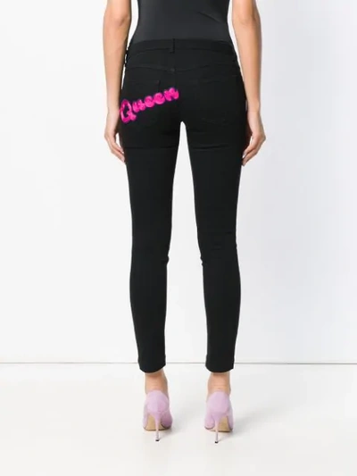 Shop Dolce & Gabbana Queen Patch Skinny Jeans - Black
