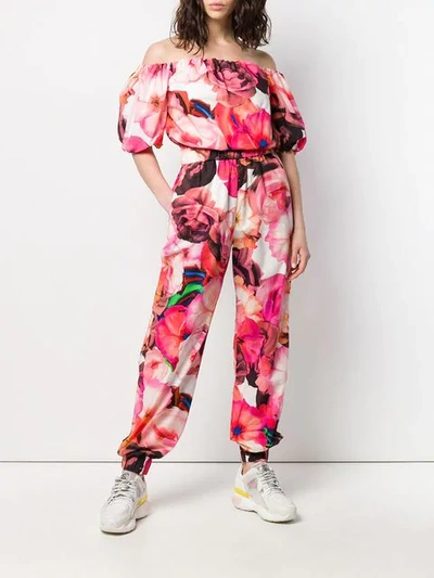 Shop Msgm Floral Print Jumpsuit In Pink
