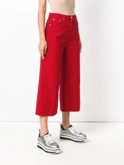 Shop Msgm Cropped Wide-leg Jeans In Red