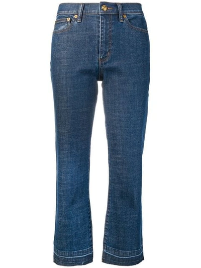 Shop Tory Burch Cropped Flare Jeans In Blue