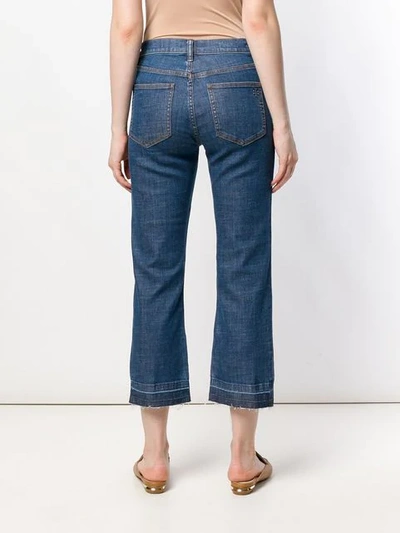 Shop Tory Burch Cropped Flare Jeans In Blue