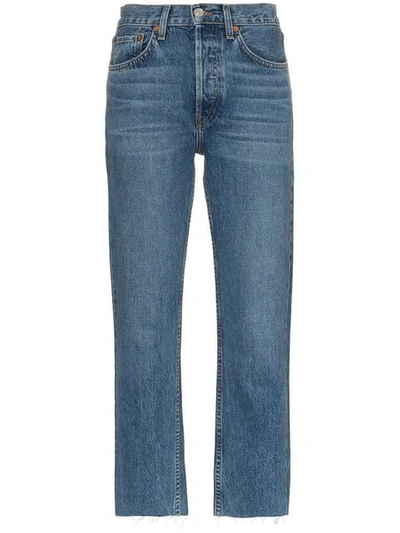 Shop Re/done High Rise Stove Pipe Jeans In Blue