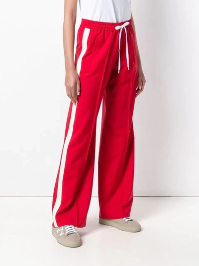 Shop Miu Miu Loose Fit Tracksuit Bottoms In Red