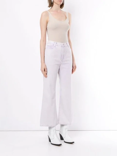 Shop Pushbutton Cropped Flared Jeans In Purple