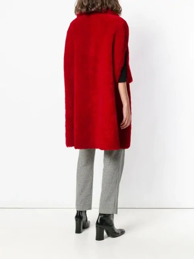 Shop Lanvin Shearling Cape In Red