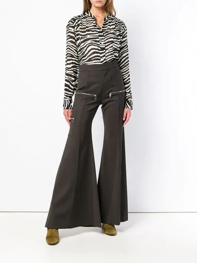 Shop Chloé Super Flared Trousers In Brown