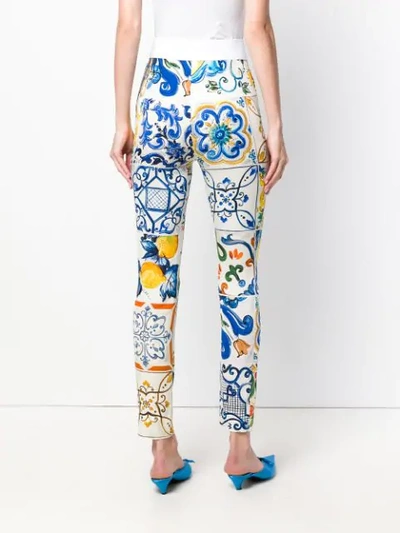 Shop Dolce & Gabbana Majolica Print Trousers In Yellow