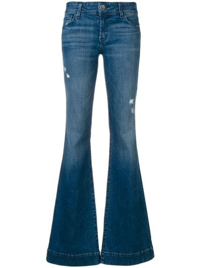 Shop J Brand Flared Leg Jeans In Blue