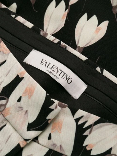 Shop Valentino Snowdrop Print Trousers In Black