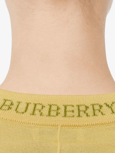 Shop Burberry Logo Detail Merino Wool Cardigan In Yellow