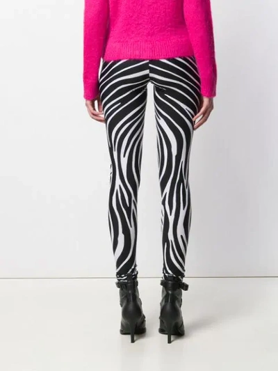 Shop Versace Zebra Print Leggings In Black