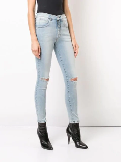 ripped seamed skinny jeans