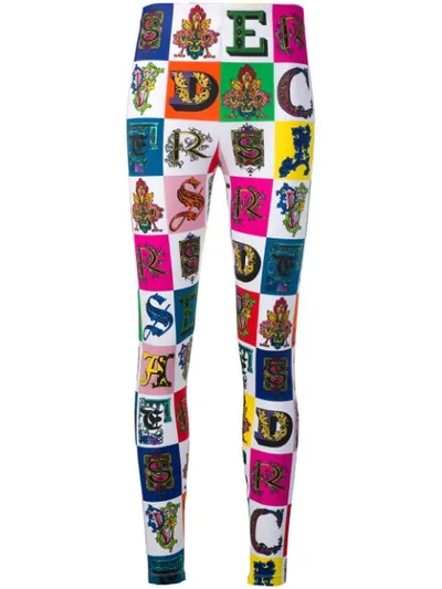 Shop Versace All Over Logo Leggings In A7001 Multicolor