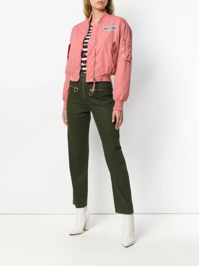 Shop Moschino Zipped Logo Bomber Jacket In Pink