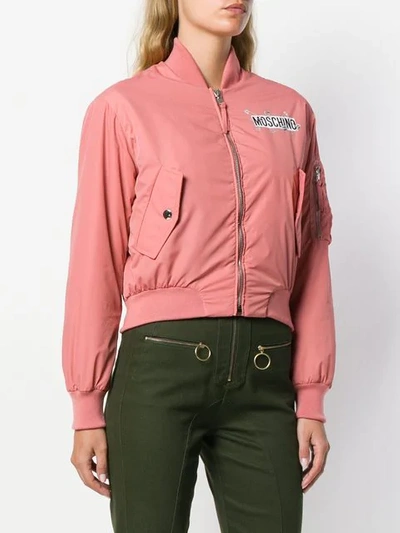 Shop Moschino Zipped Logo Bomber Jacket In Pink