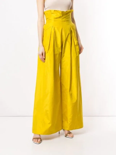 Shop Abadia Pleated Taffeta Silk Trousers In Yellow