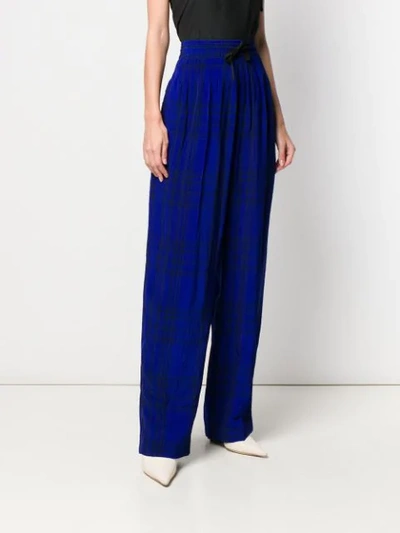 Shop Haider Ackermann Check Elasticated Trousers In Blue