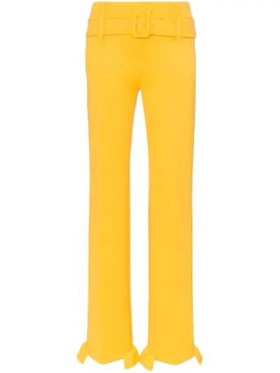 Shop Prada Belted Ruffle Hem Straight Trousers In Yellow