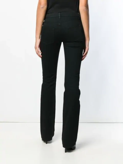 Shop Saint Laurent Schmale Bootcut-jeans In Black