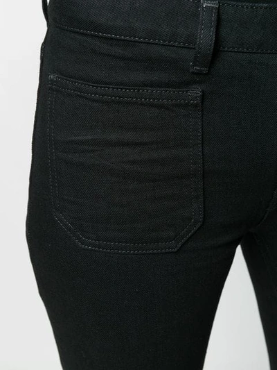 Shop Saint Laurent Schmale Bootcut-jeans In Black