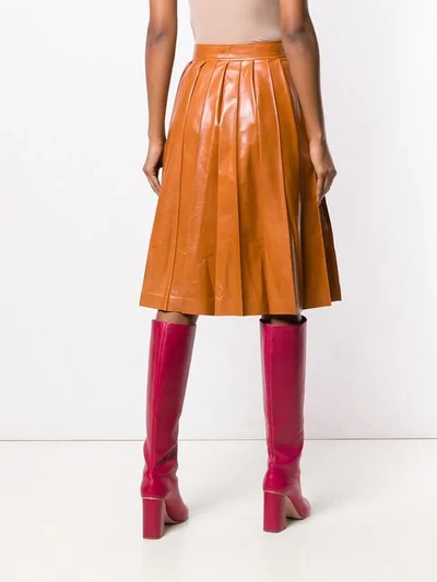 Shop Bottega Veneta Shiny Pleated Leather Skirt In Orange