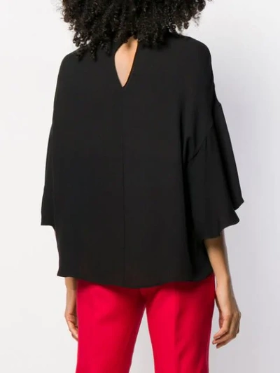 Shop Valentino Ruffled Batwing Blouse In Black