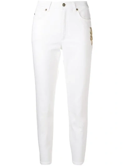 Shop Escada Cropped Skinny Jeans In White