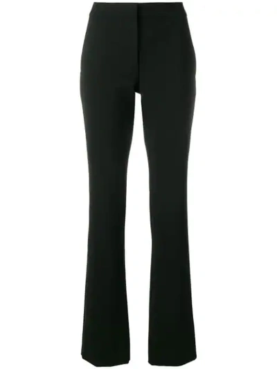Shop Moschino Wide Leg Trousers In Black