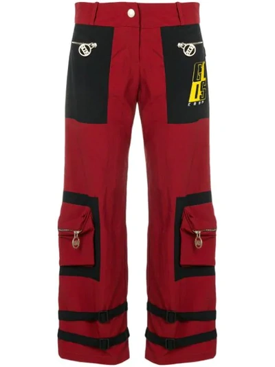 Shop Gcds Buckle Strap Detail Cropped Trousers In Red