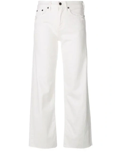 Shop Simon Miller Wide Leg Frayed Jeans In White