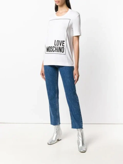 Shop Love Moschino Logo Short In White