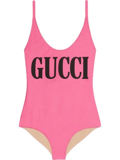 Shop Gucci Logo Print Cross-over Strap Swimsuit In Pink