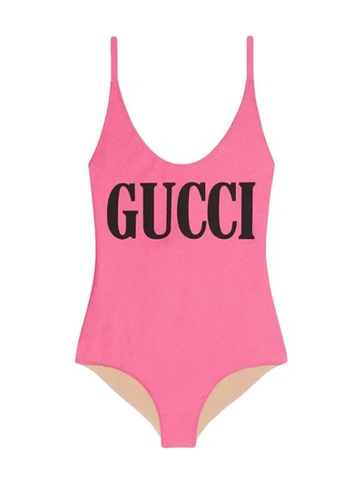 Shop Gucci Logo Print Cross-over Strap Swimsuit In Pink