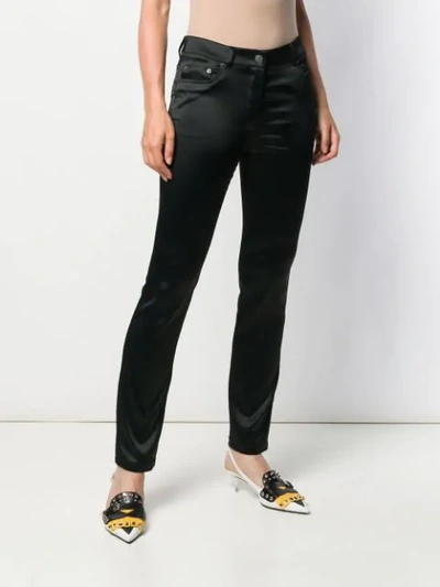 Shop Moschino Classic Skinny-fit Trousers In Black