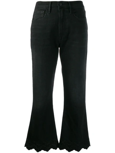 Shop Frame Lacey Flared Jeans In Black