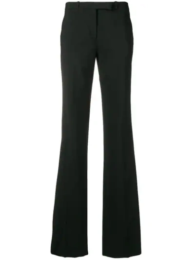 Shop Etro Side Stripe Flared Trousers In Black