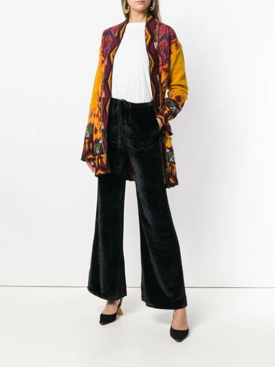 Shop Etro Flared Trousers In Black