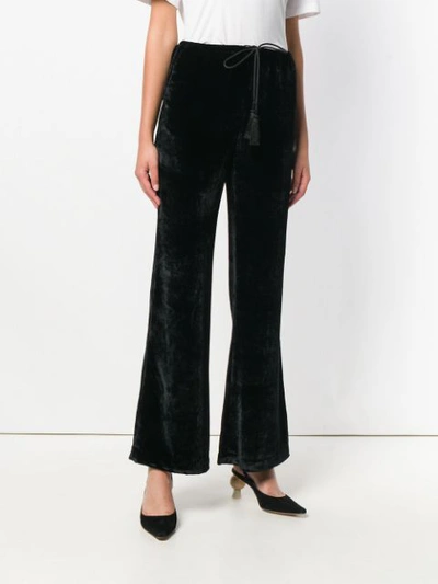 Shop Etro Flared Trousers In Black