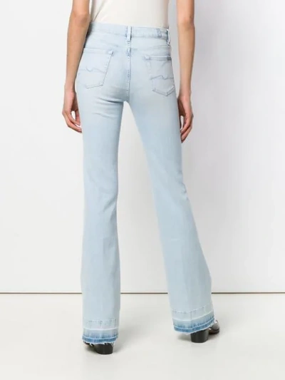 Shop 7 For All Mankind San Clamente Flared Jeans - Blue