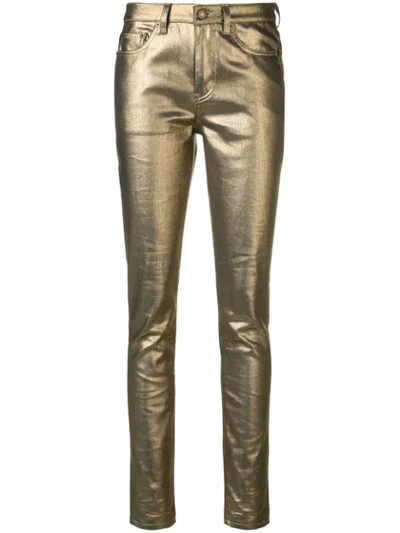 Shop Saint Laurent Skinny Jeans In Gold