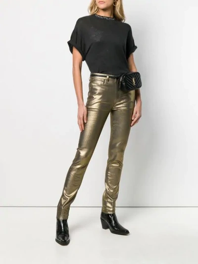 Shop Saint Laurent Skinny Jeans In Gold
