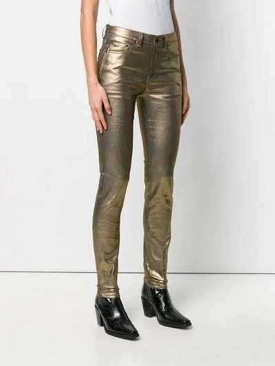 Shop Saint Laurent Skinny Jeans In Gold