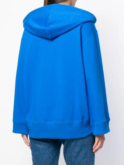 Shop Tommy Hilfiger Printed Oversized Hoodie In Blue